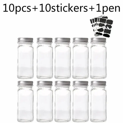 Modern clear glass seasoning jar set with ten clear glass seasoning jars with silver metal lids arranged in two rows