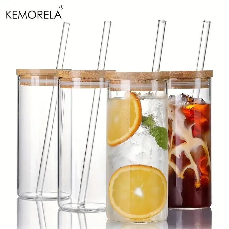 Modern clear glass tumbler cups with bamboo lids and matching clear straws in a sleek 4-piece kitchen set