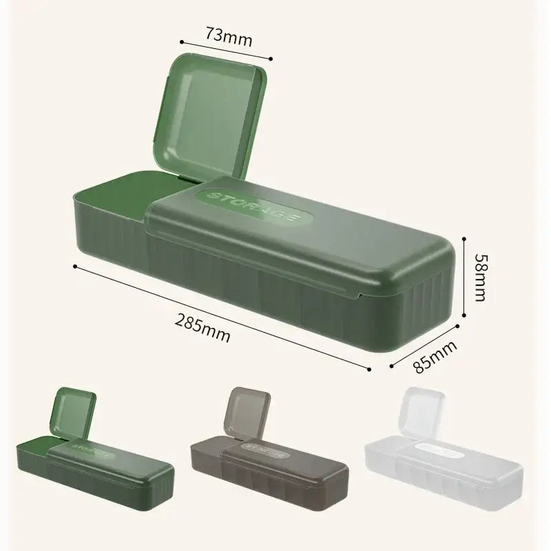 Dark green plastic pill organizer with hinged lid and compartments shown alongside modern clear and gray decorbites cable box desk organizer