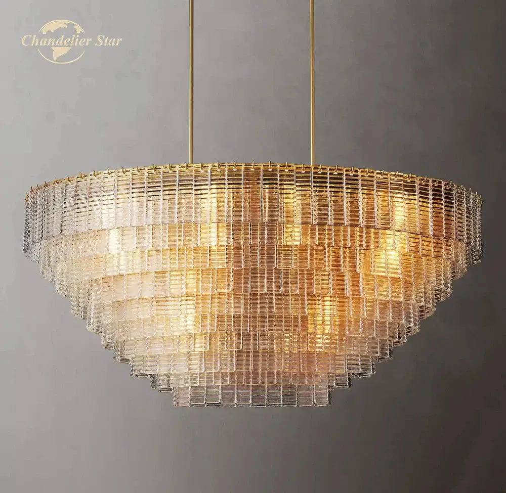 Modern clear smoke glass oval chandelier with golden brass frame and cascading clear rectangular glass tiers for dining room decorbites clear smoke