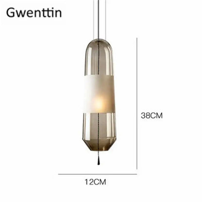 Gwenttin modern glass pendant light with sleek elongated amber and clear glass body for dining room use