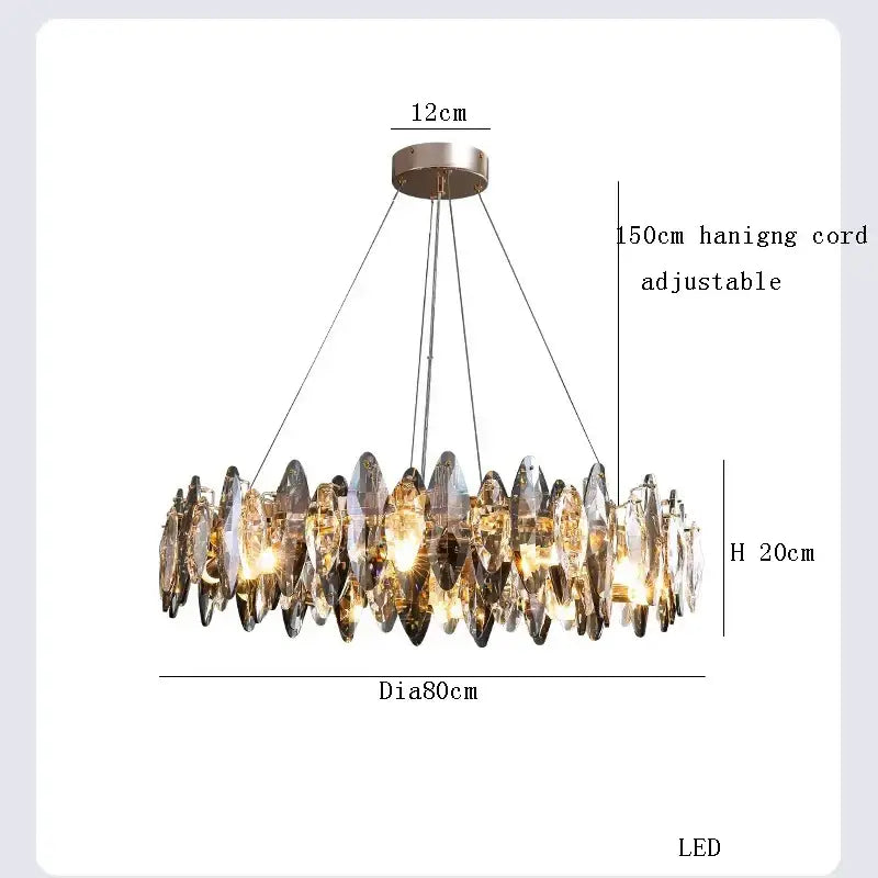 A modern clear and smoky decorbites crystal led chandelier with faceted crystal pendants in a circular metallic mount
