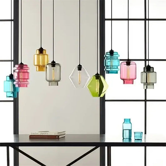 Modern colorful geometric glass pendant lights with exposed filament bulbs and black cords for kitchen lighting decorbites geometric glass