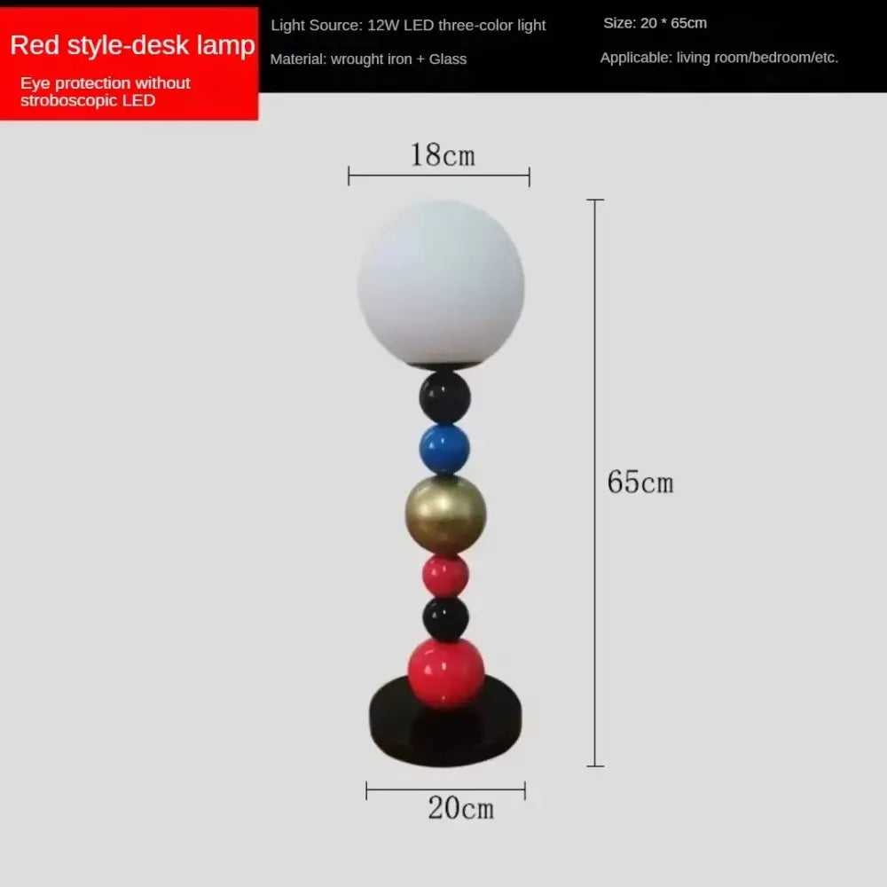 Modern colorful glass ball floor lamp with a red base and white glass globe shade for living room use