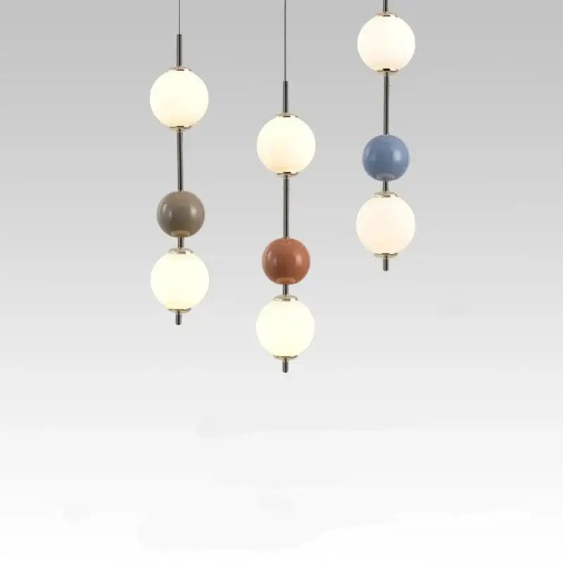 Modern colorful glass ball led pendant light with spherical matte white, gray, terracotta, and blue globes for dining room decorbites