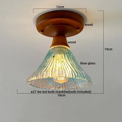 Modern colorful glass led ceiling lamp with a warm wood base and translucent blue decorbites colorful glass shade