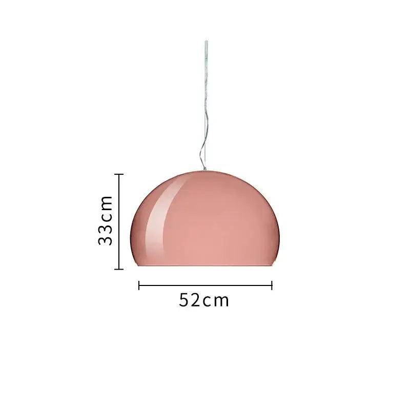 A modern colorful translucent dome pendant lamp in matte rose gold with a sleek curved surface and slender chain hanging light