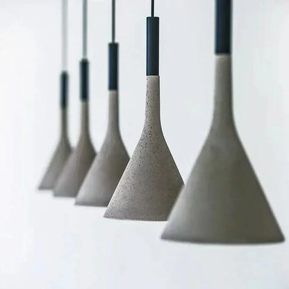 Modern conical concrete pendant lights with speckled gray finish and black tops for kitchen and dining room decorbites concrete pendant