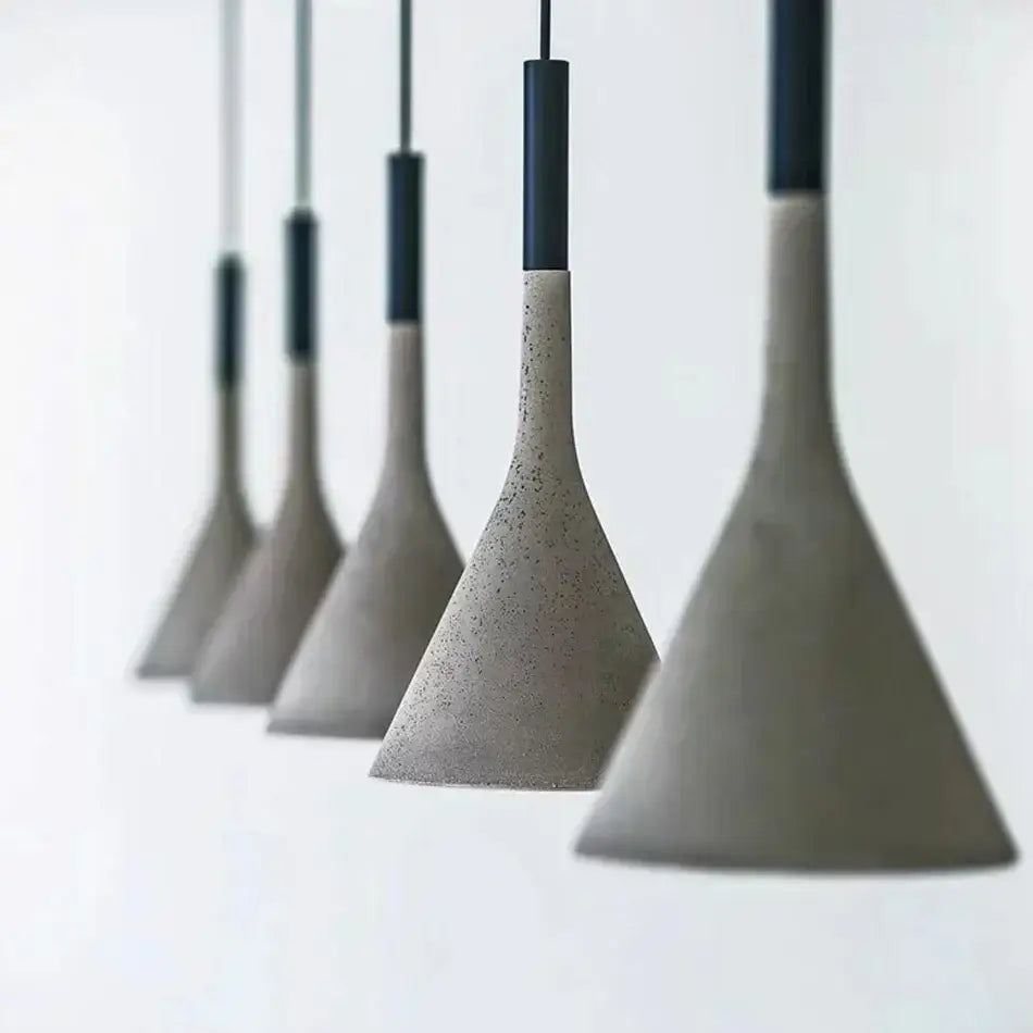 Modern conical concrete pendant lights with speckled gray finish and black tops for kitchen and dining room decorbites concrete pendant