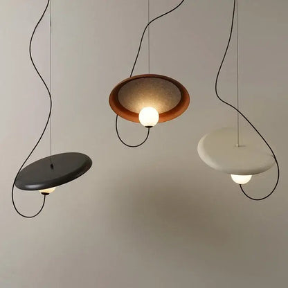 Modern copper and black grid color led pendant light with three matte black, warm brown, and off-white circular shades