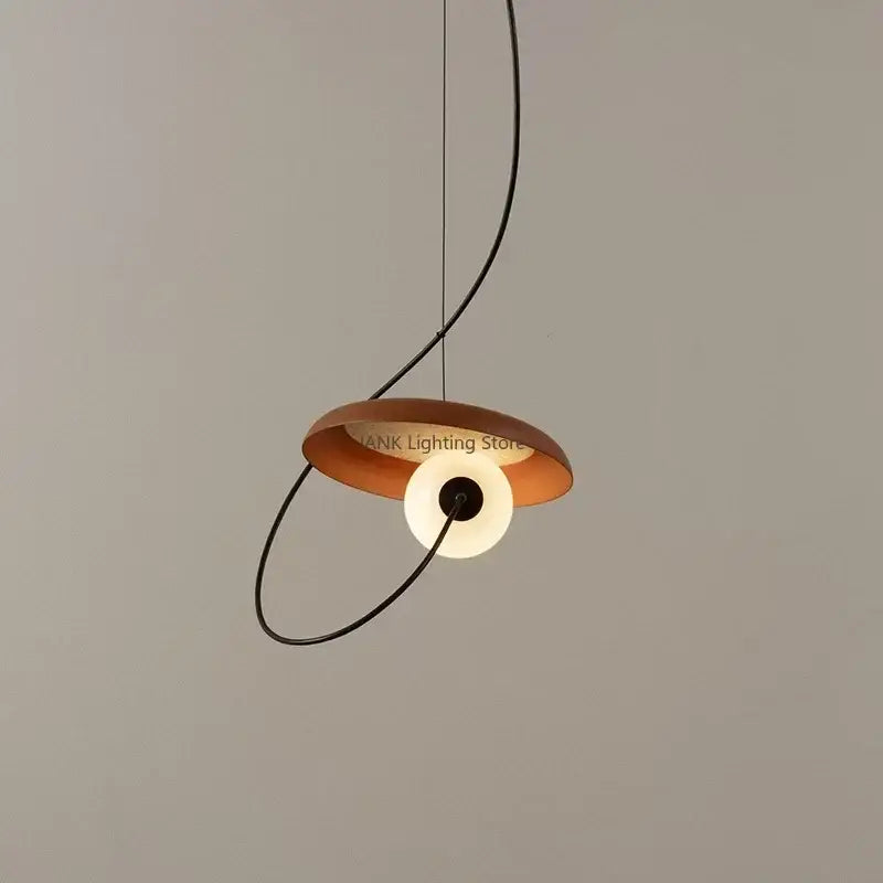 Modern copper and black grid color pendant light with warm circular shade and illuminated white disc for dining room decorbites grid color led