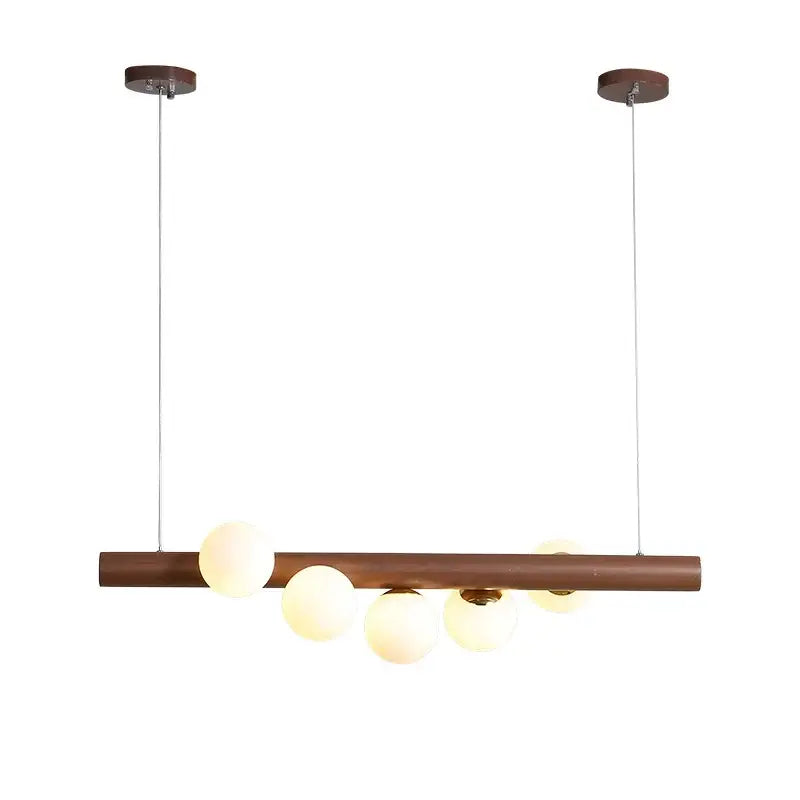 Modern pendant light with sleek burly wood walnut bar and five frosted glass globes by decorbites for living room decor