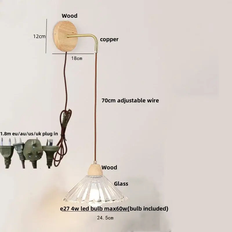 Modern copper and wood wall sconce with natural wood base, clear glass frilled shade, and pull chain switch