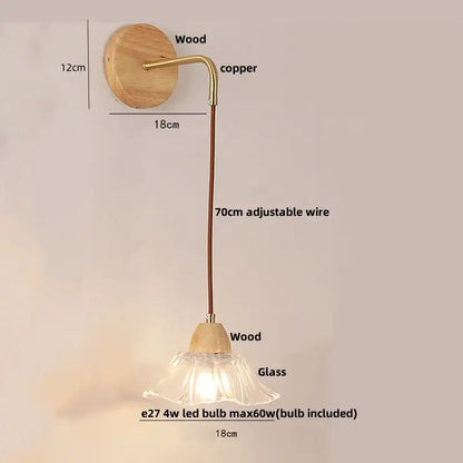 Modern copper and wood wall sconce with clear glass bell shade and adjustable pull chain switch for rustic lighting