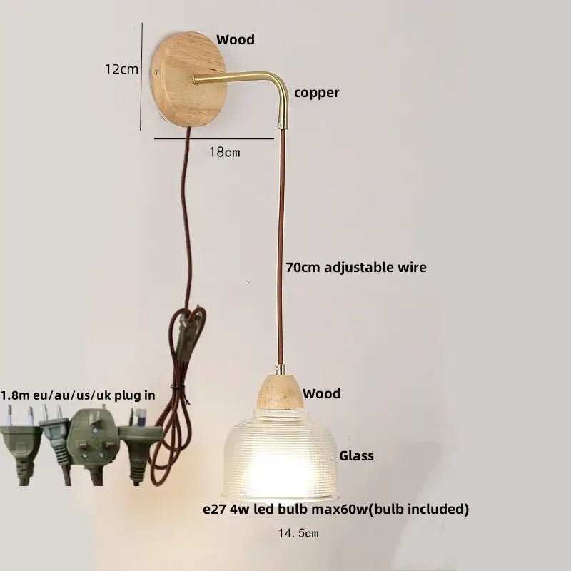 Modern copper and wood wall sconce with warm tones, ribbed clear glass shade, and pull chain switch for easy control