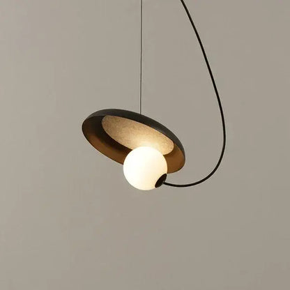 Modern pendant light with sleek black metal frame and warm frosted glass globe for decorbites grid color led dining room