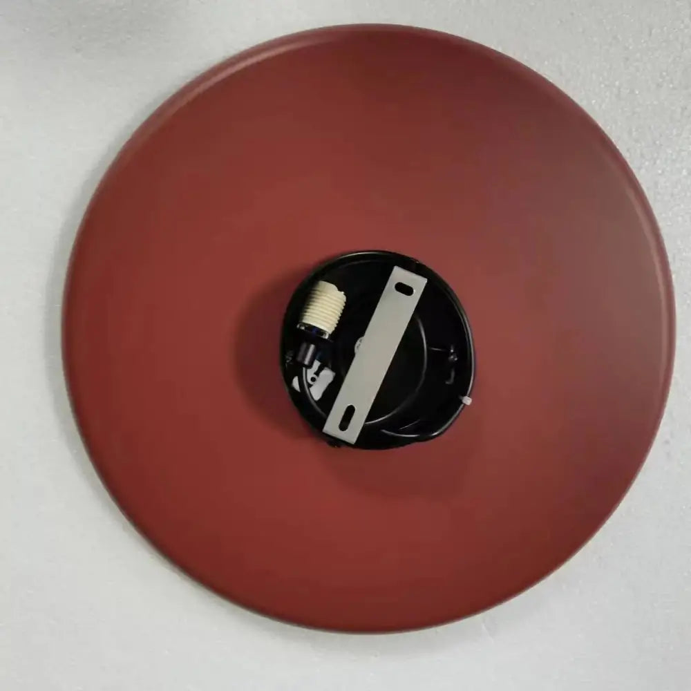 Modern copper decorbites grid color pendant light with a matte red finish and black mounting bracket for dining room use