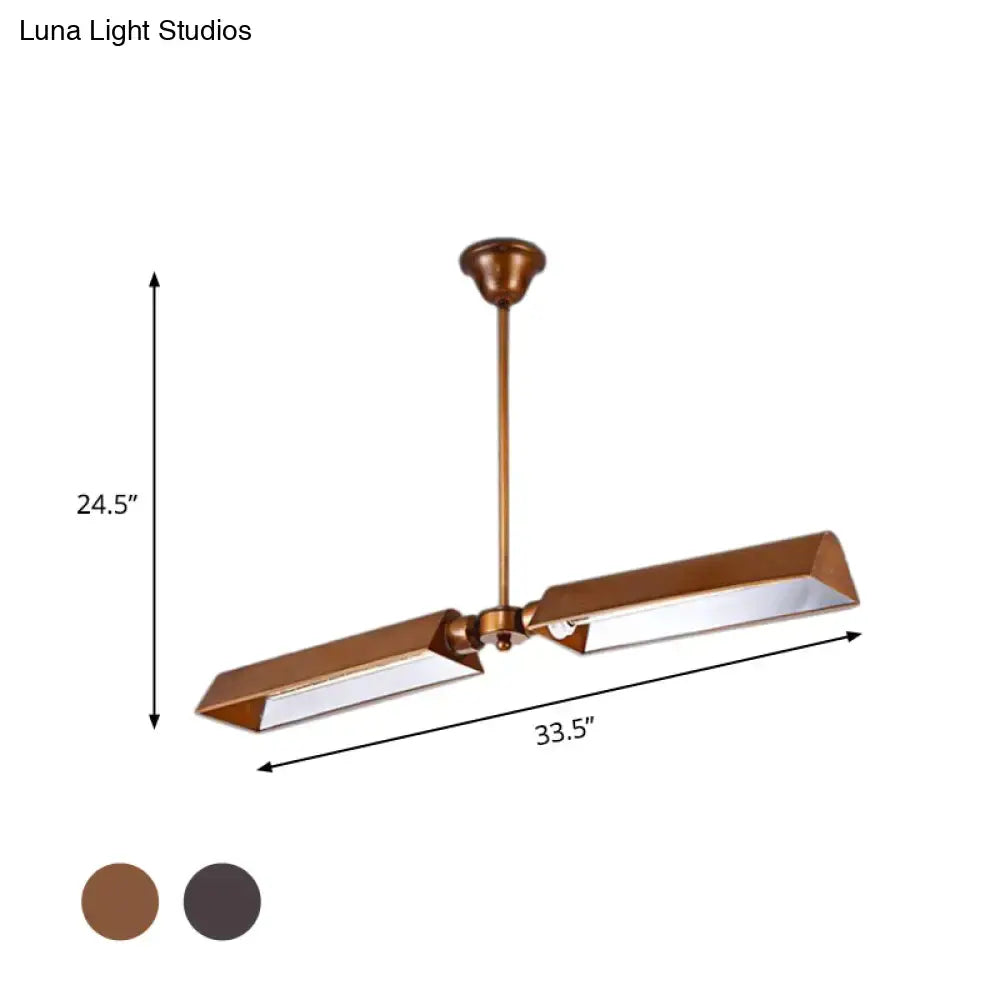 Brass-finished pendant light with dual arms and rectangular glass panels metal triangle island style for kitchen use