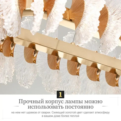 Modern coral flower crystal chandelier with gold-toned frame and clear fan-shaped glass shades for dining room decorbites coral flower