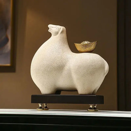 Modern cream and gold horse sculpture figurine with textured ceramic surface and golden ingot decorbites horse sculpture