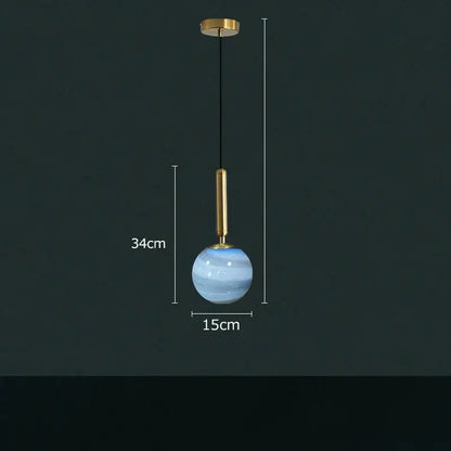 A sleek 34cm tall modern cream and blue glass planet pendant light with swirling patterns for bedroom use