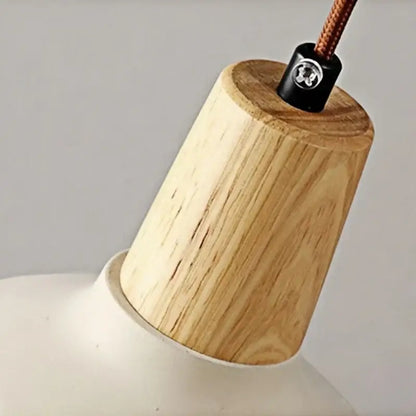 Modern cream ceramic wall lamp with lightweight oak wood shade, pull chain switch, and braided copper cable