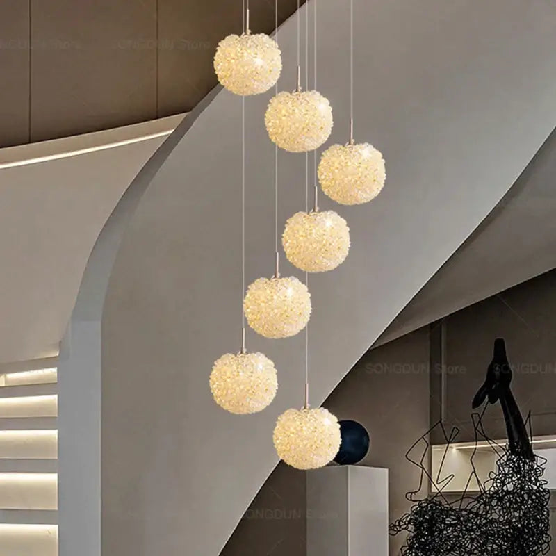Modern cream crystal round room chandelier with six textured spherical lights for bedroom decorbites crystal round design