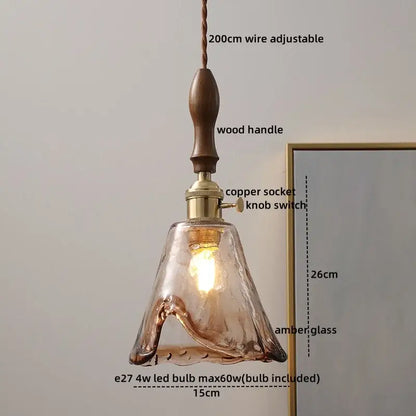 A warm amber glass copper led pendant light with wooden handle for modern dining room pendant lights