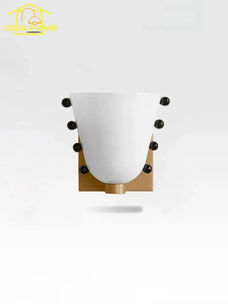 White ceramic wall lamp with gold-toned base and black accents for decorbites cream glass wall sconce bedroom decor