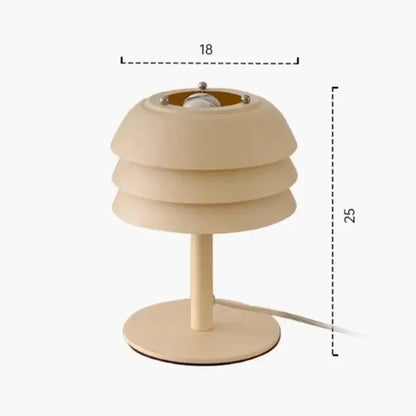 Modern cream medieval design led table lamp with a cream-colored tiered shade and slender stem for bedroom decorbites decor