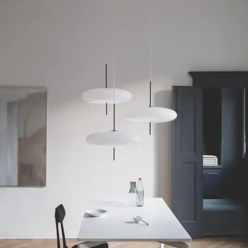 Modern creative iron pendant light with white disc shades and black cords suitable for bar and restaurant decorbites iron pendant
