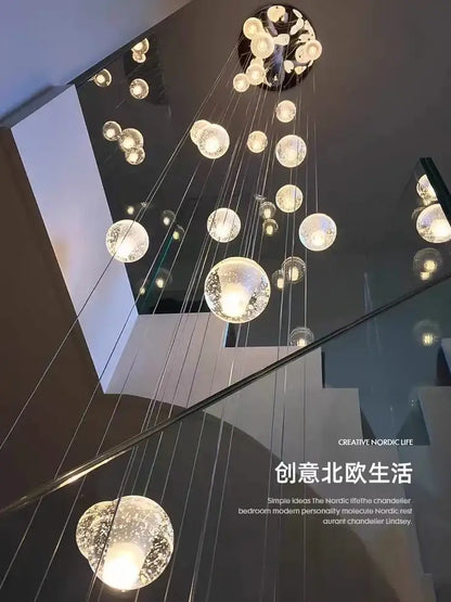 Modern crystal ball led chandelier with clear glass orbs suspended by cables for living room decorbites crystal ball design