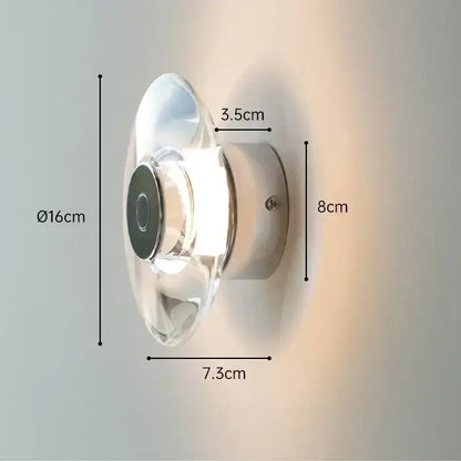 Modern crystal bedside wall lamp with clear glass shade and chrome metallic base for elegant bedroom decorbites crystal bedside design