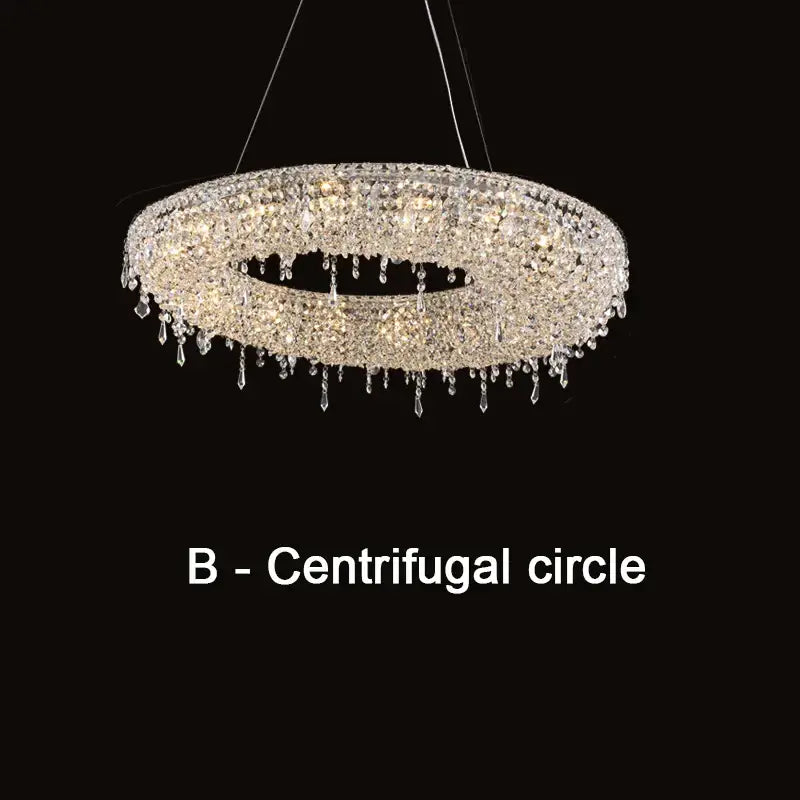 Modern crystal bird nest chandelier with circular design and teardrop crystals illuminated by warm lights for dining room