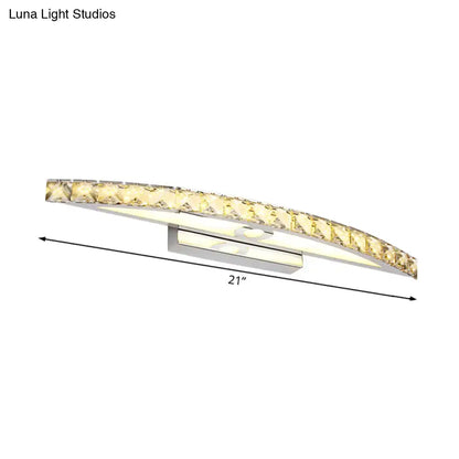 Modern crystal bow bathroom sconce featuring a sleek 21-inch arched clear champagne design with polished chrome and led product bulb