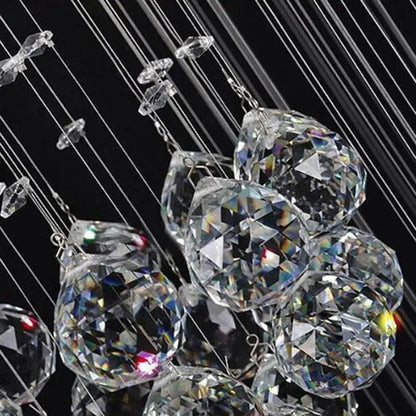 Modern crystal chandelier with clear faceted glass spheres hanging on thin wires by decorbites crystal chandelier
