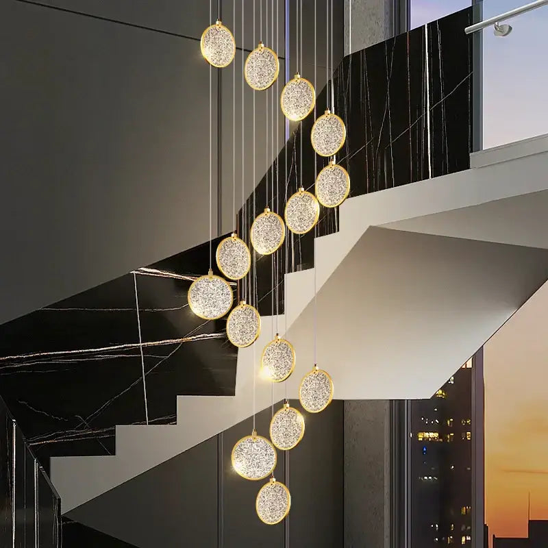 A modern crystal double story led ring chandelier with gold frames and sparkling crystal interiors for living rooms