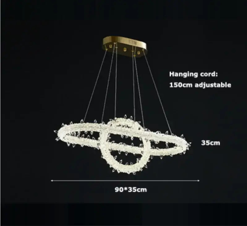 A modern crystal flower led chandelier with double gold rings and clear crystal accents for dining room decorbites decor
