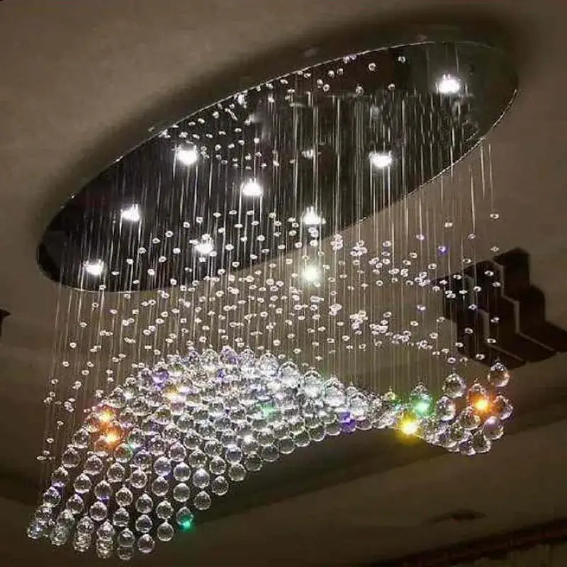 Modern crystal flush mount oval chandelier with clear and multicolored glass beads on a dark metallic frame for living room decorbites flush mount lighting fixture