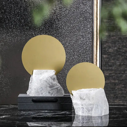 Modern crystal geometric metal sculpture bookends with translucent quartz bases and polished gold tops for living room decorbites