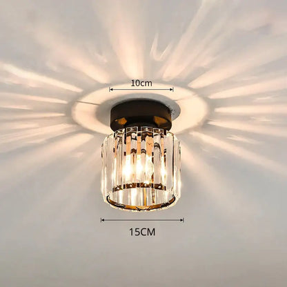A modern crystal glass nordic LED chandelier with black base and clear vertical prisms for dining room decorbites decor