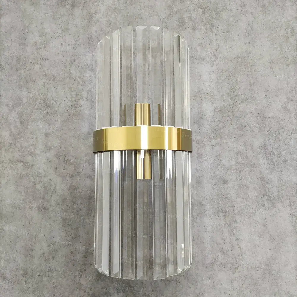 Clear glass wall lamp with vertical fluted rods and polished gold metal band decorbites crystal gold led lighting