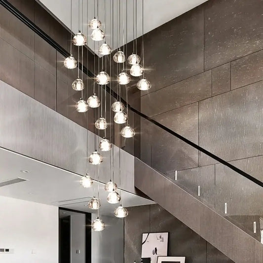 Modern crystal led ceiling chandelier with clear glass globe bulbs and cascading design for living room decorbites crystal led