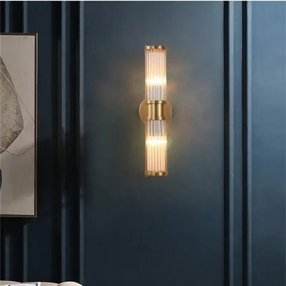Modern crystal led gold wall sconce with two vertical clear ribbed glass tubes for bedroom decorbites crystal led lighting