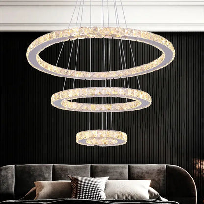 Modern crystal led pendant double ring chandelier featuring a three-tiered crystal led design with clear faceted crystals and silver frame