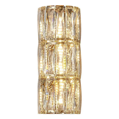 Modern gold-toned decorbites crystal led wall lamp with vertical facets and integrated lighting for living room decor