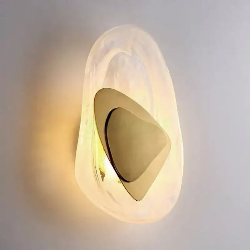 Modern crystal led wall lamp with a frosted glass shell and bronze accent for elegant living room decorbites crystal led lighting