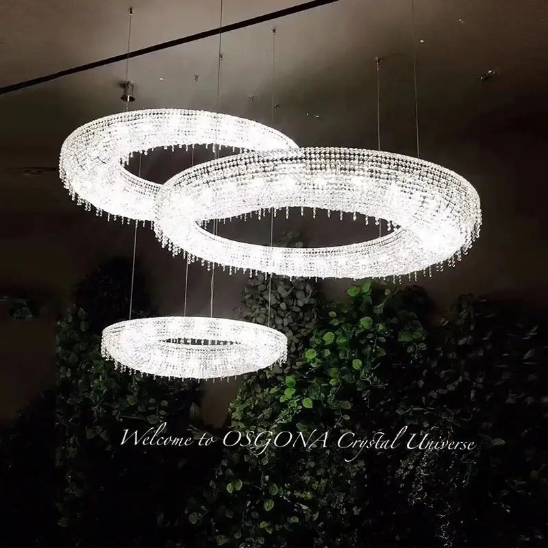 Three interlocking decorbites crystal oval chandeliers with clear faceted glass beads for modern living room lighting