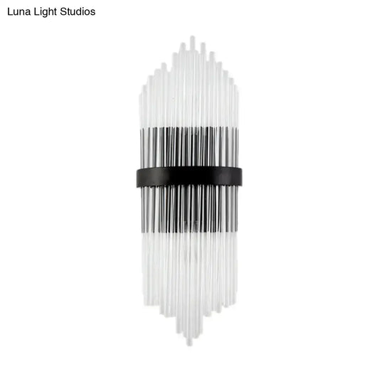 Modern crystal prism wall sconce with clear glass tubes and a black metal square backplate for living room lighting