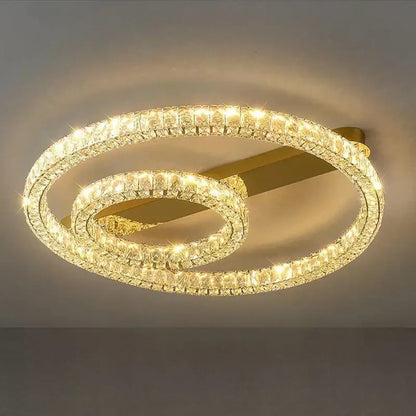 Modern crystal ring ceiling light with gold-toned metal and clear crystal accents for dining room decorbites crystal ring